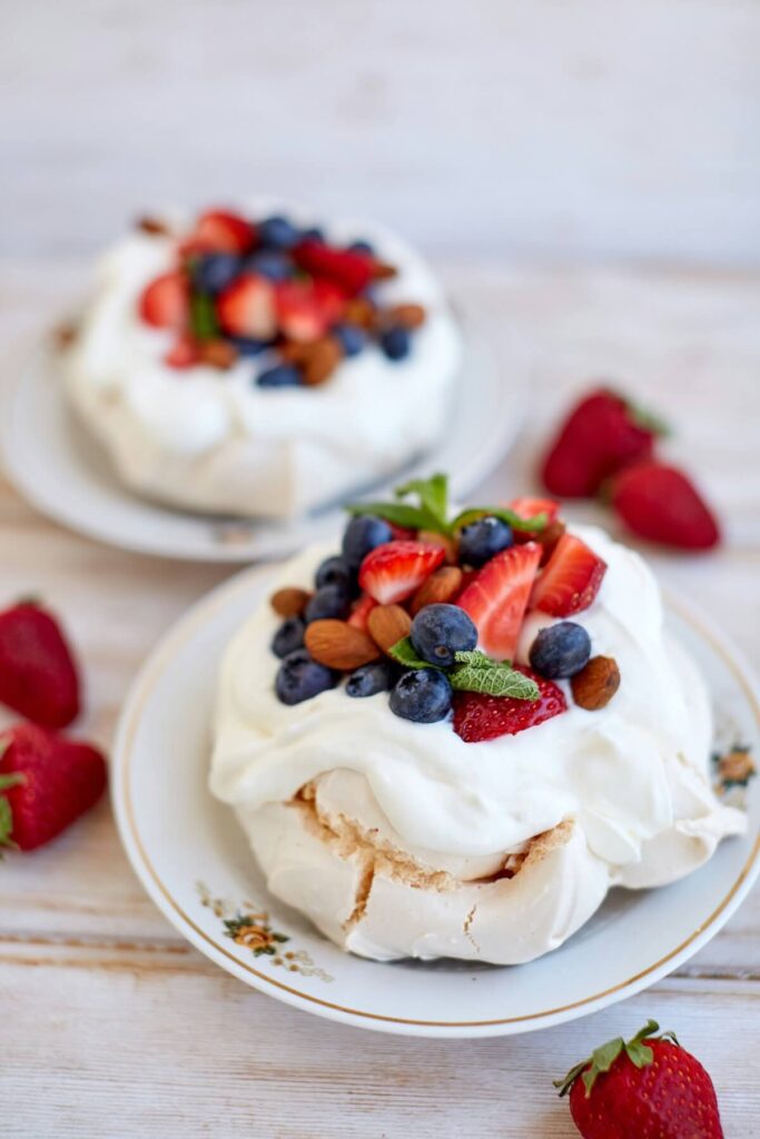 pavlova, a meringue-based dessert named after the Russian ballerina Anna Pavlova, with fruit toppings