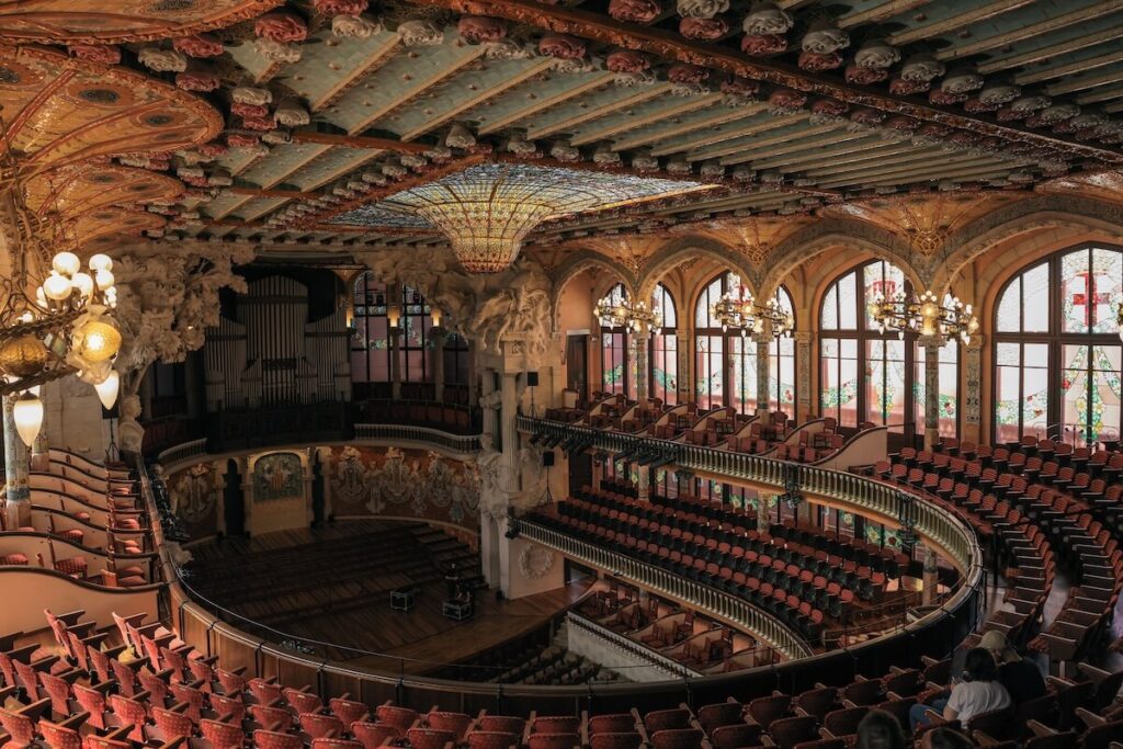Stunning interior of Palau de la Música Catalana showcasing its ornate architecture and colorful details