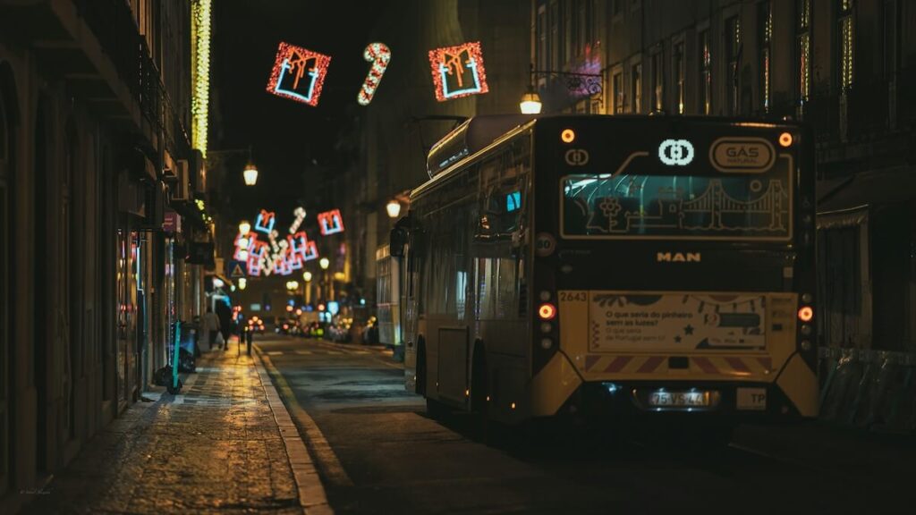 yellow bus in Lisbon at night