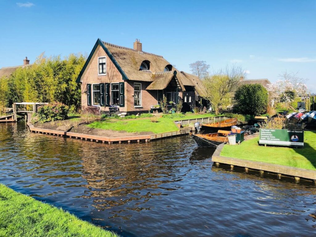 a canal in Giethoorn on a sunny day