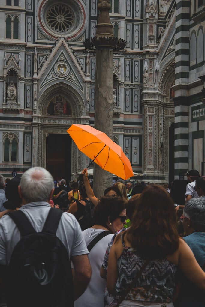 tour guide with umbrella in florence