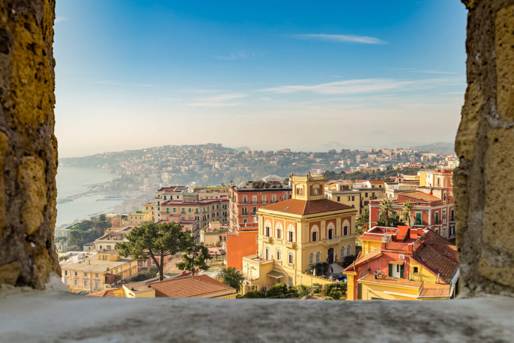 amazing view of the roofs of Napoli, Italy trough medieval rock window