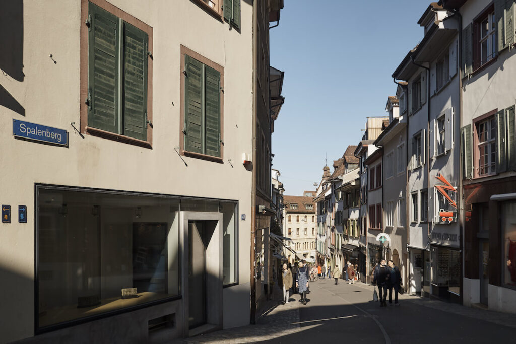 Spalenberg ('Spalen mountain') shopping street with people strolling, in downtown Basel