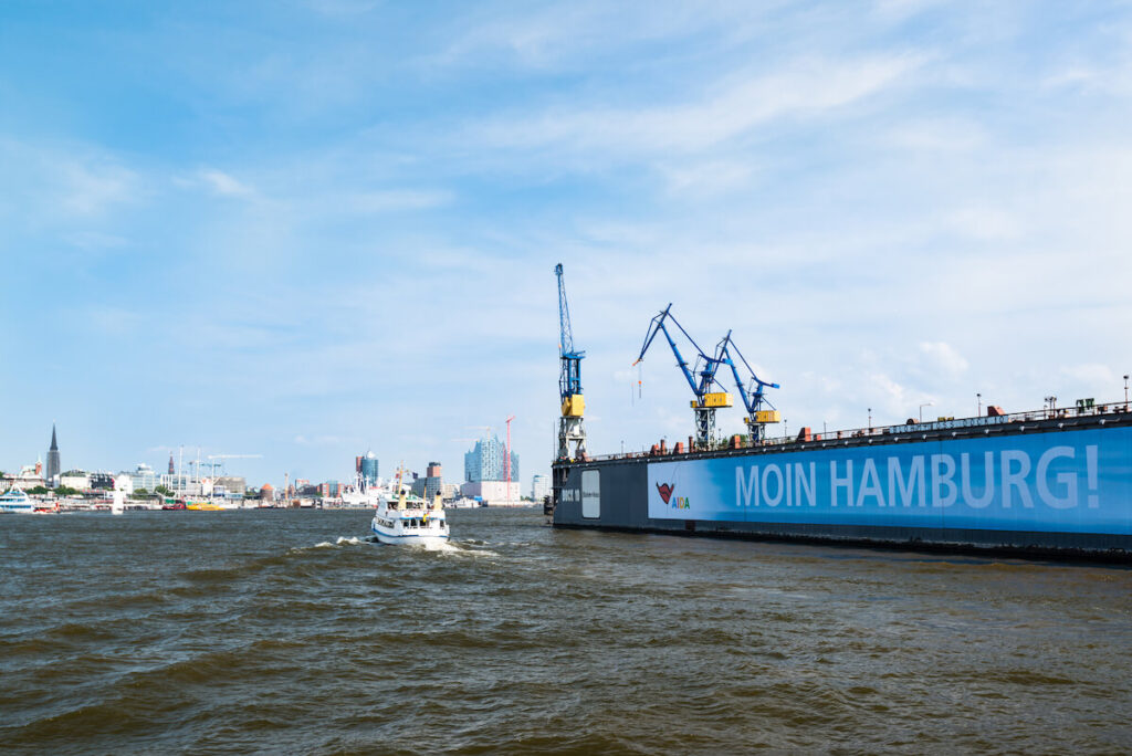The famous Blohm And Voss drydock number 10 with a banner stating Moin (local slang for Good Morning) Hamburg