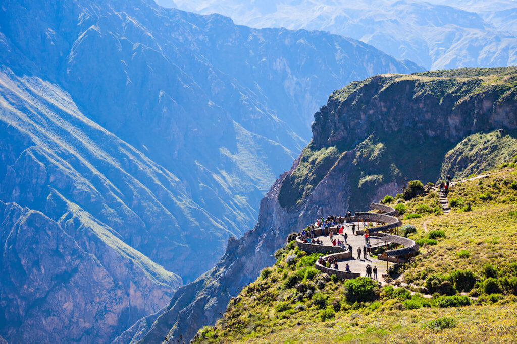 Tourists at the Cruz Del Condor viewpoint, Colca canyon, Peru