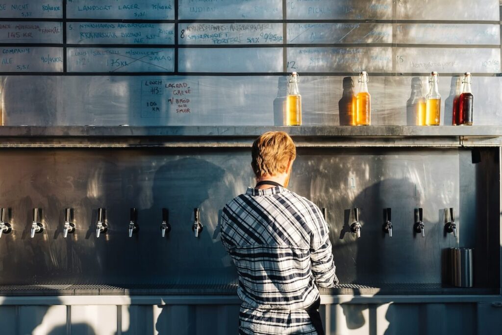 man working in a bar in Sweden