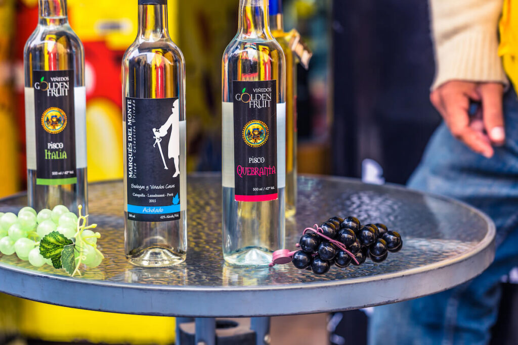 Bottles of Pisco Sour in a bar in Lima, Peru