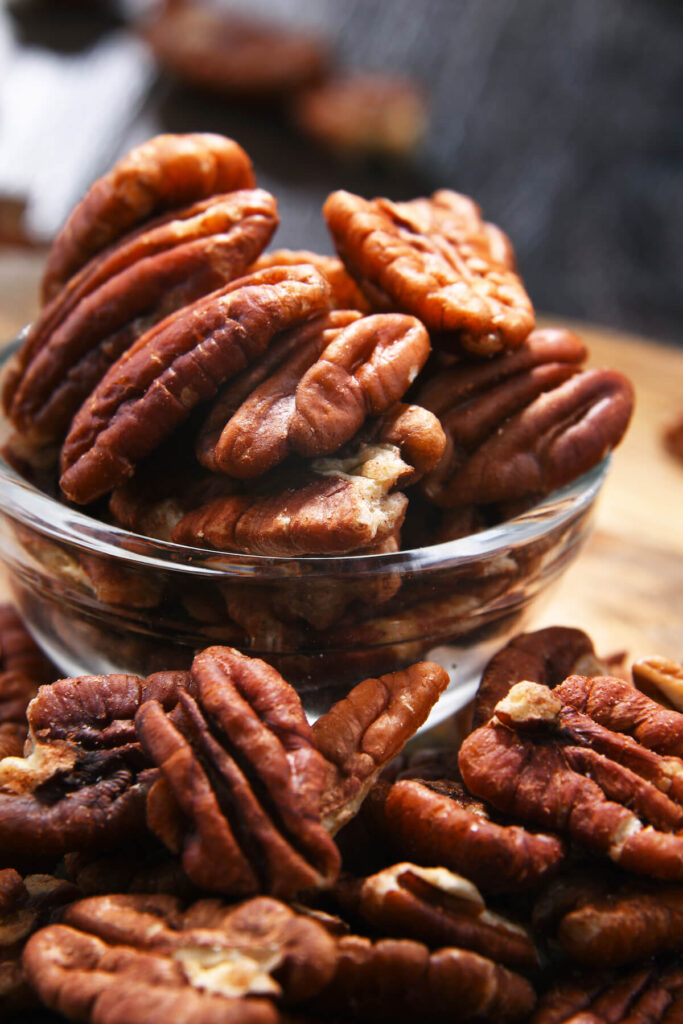 a bowl of shelled pecan nuts