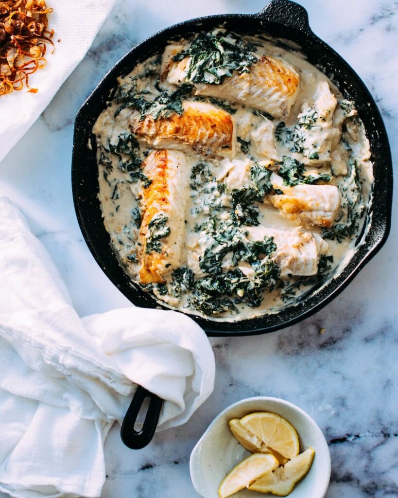 pan with fish in cream sauce