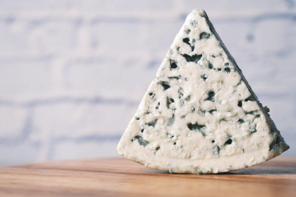 gorgonzola cheese on wood
