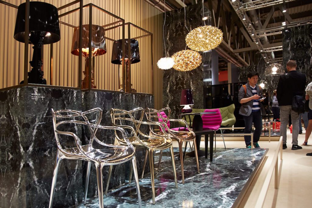 Milan Design Week, people at Kartell stand at Salone del Mobile