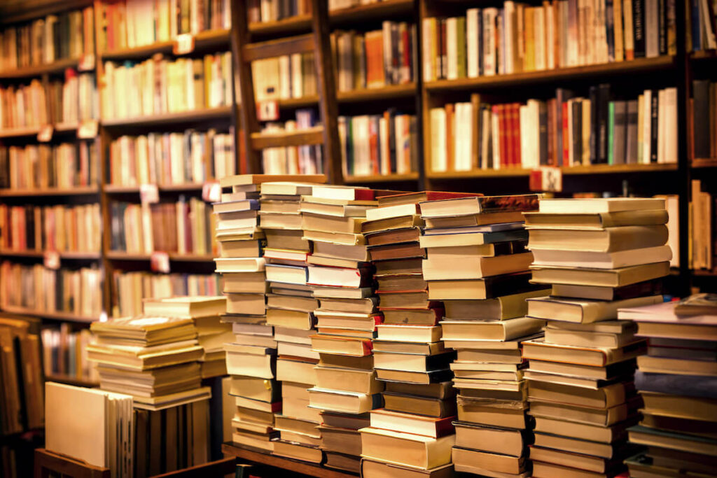 pile of used books in a bookstore