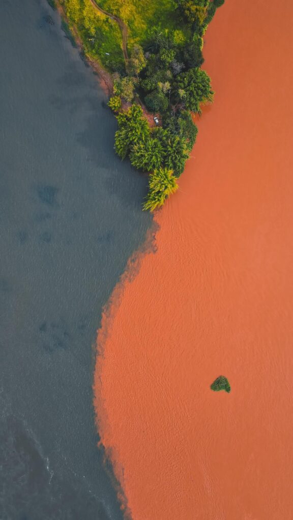 Meeting of waters of Amazon River flowing in nature