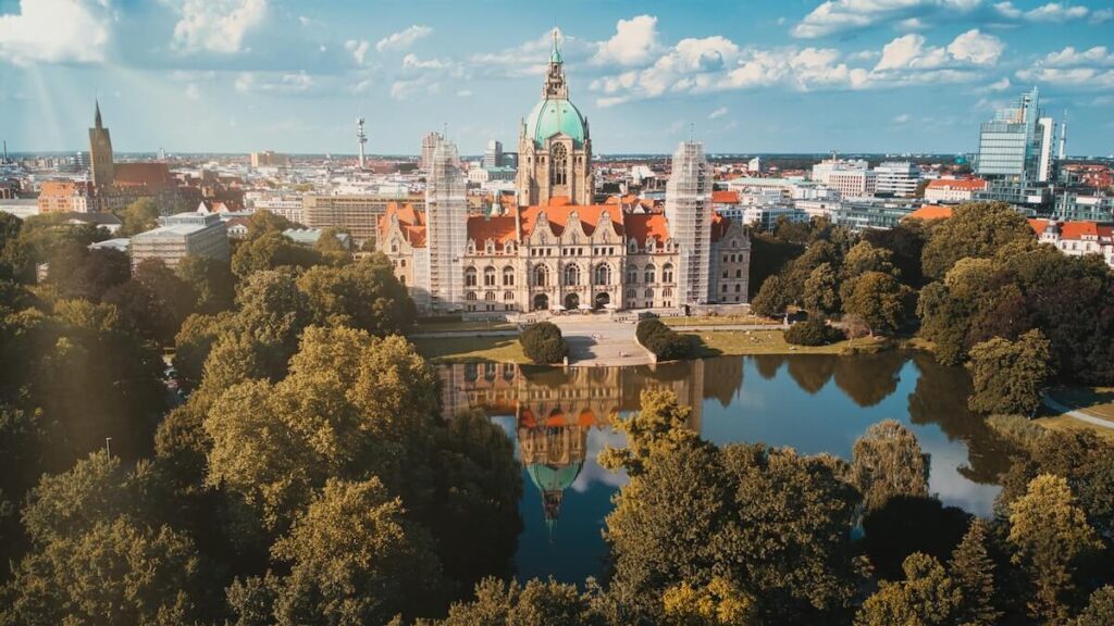 Hanover town hall surrounded by water and greenery