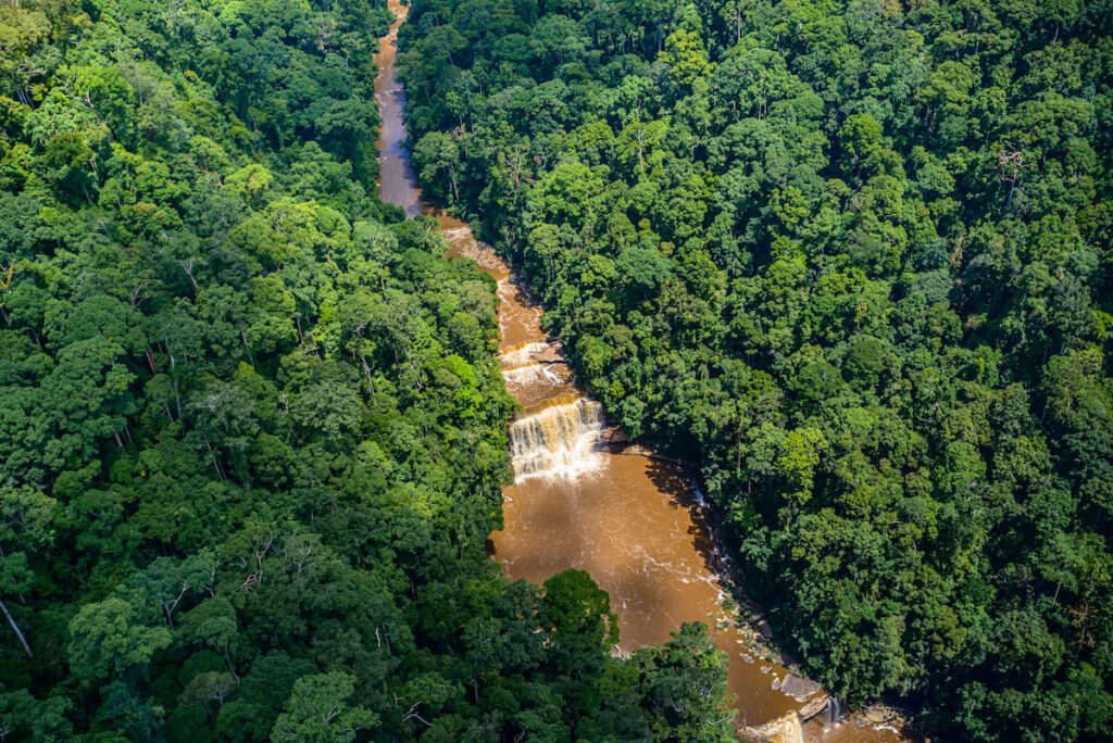 An aerial view of the most famous waterfall located in Maliau Basin Conservation Area in Sabah, Malaysia