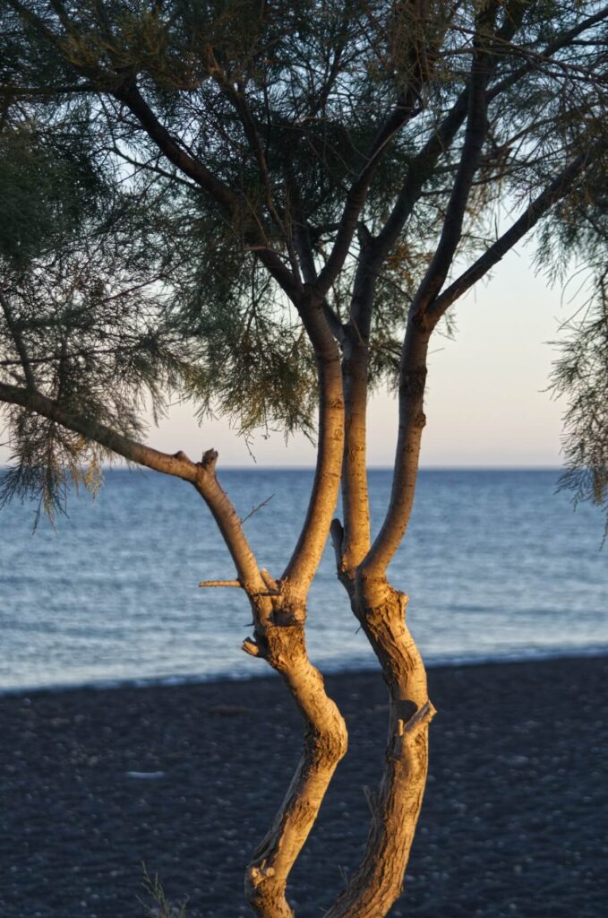 Perissa beach, one of the popular black beaches in Santorini