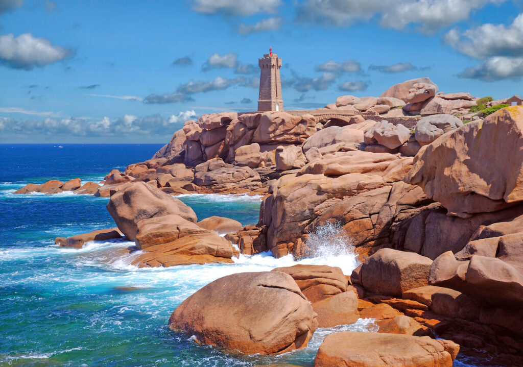 Lighthouse near Ploumanach in Brittany called Phare de Mean Ruz at Cote de Granite Rose,France