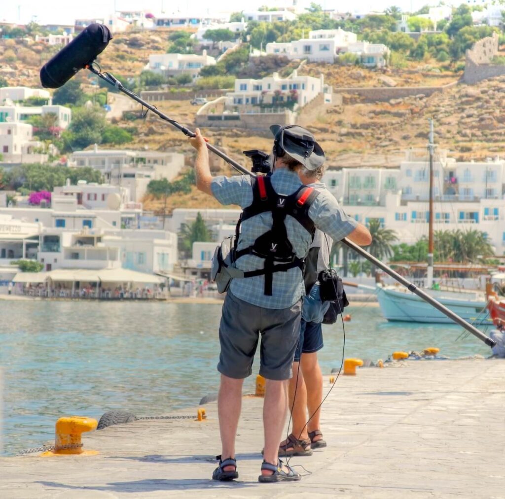 Film crew in action on the Island of Mykonos during the making of a filmscene