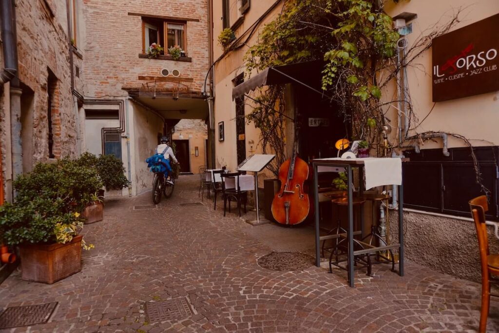 man riding a bike in como