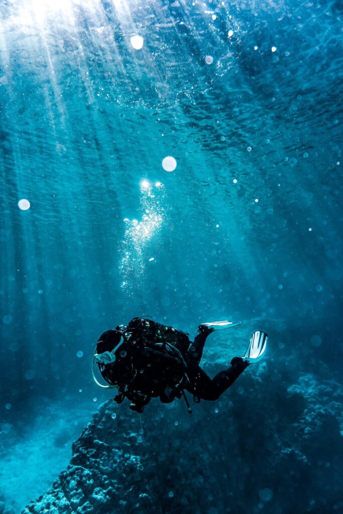 scuba diver on water