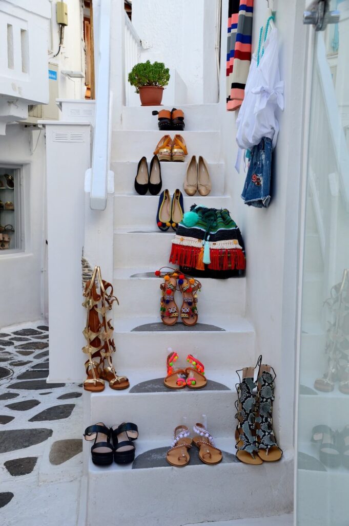 white stairs with colorful shoes