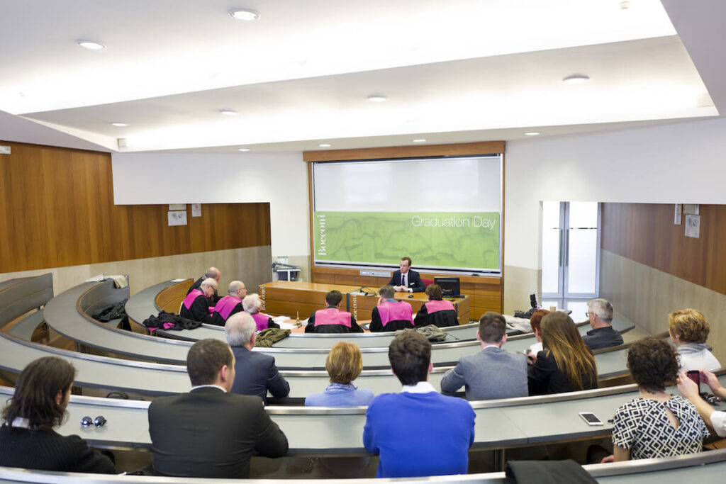 professors of the Bocconi University listening to a student's degree discussion, in Milan