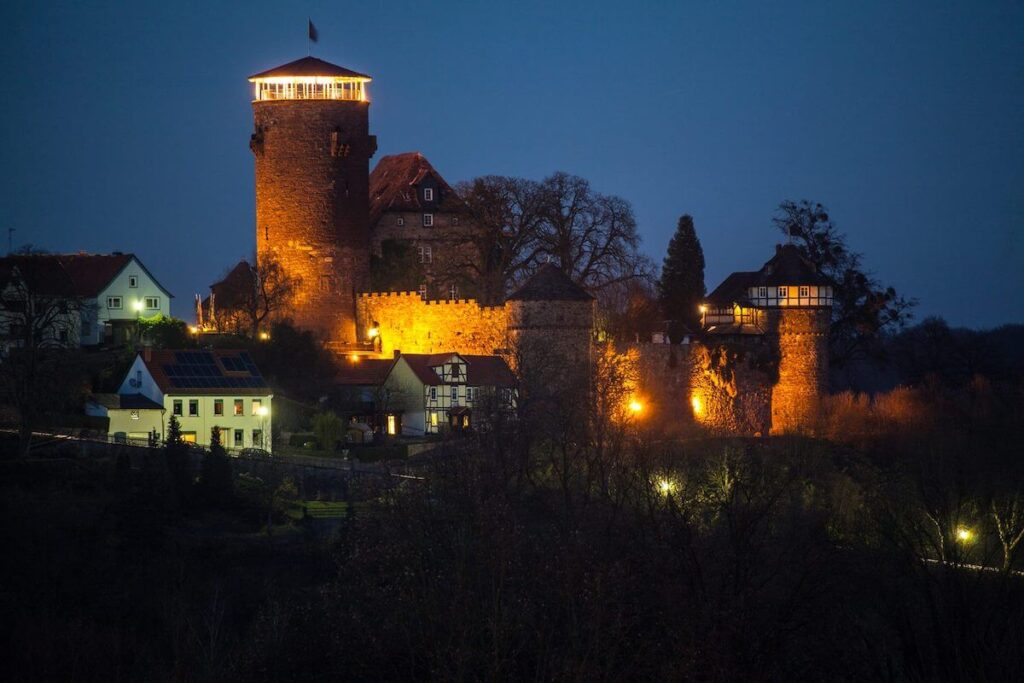 The Rapunzel tower of Burg Trendelburg at nighttime