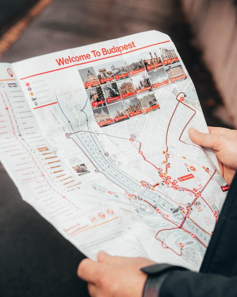person holding map of Budapest