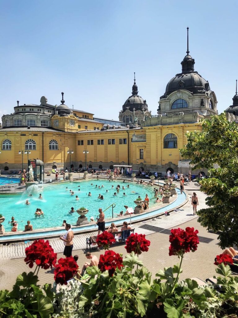 people lounging at the Szechenyi Thermal Bath in Budapest