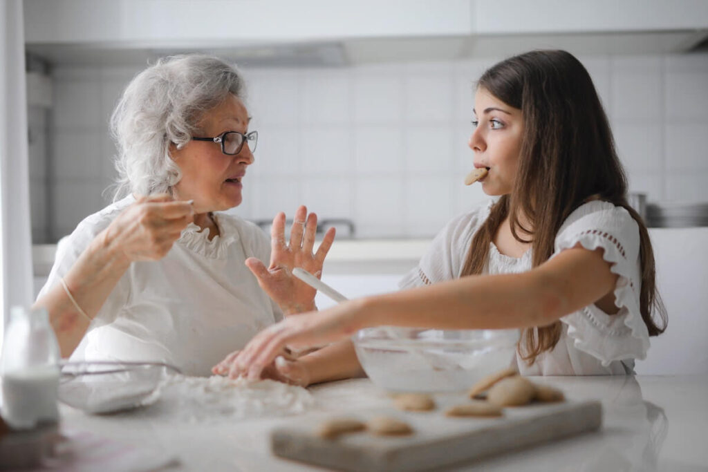 grandmother and grandchild cooking