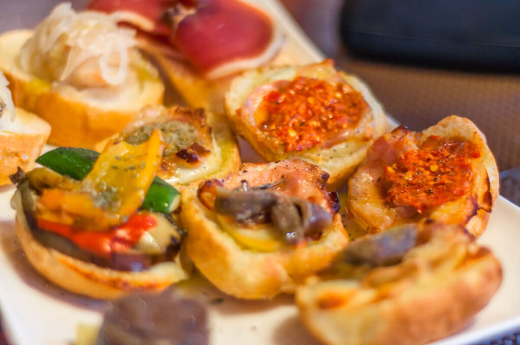 Cicchetti are small snacks served in traditional bars in Venice
