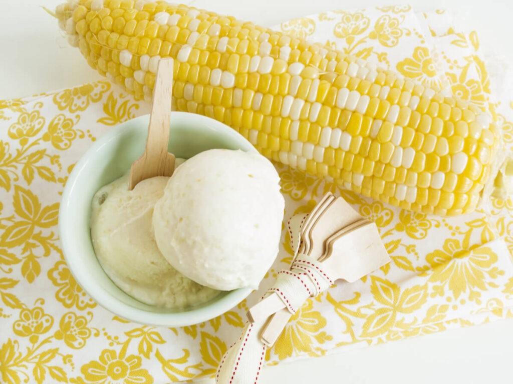 Gourmet Olathe sweet corn gelato on white background