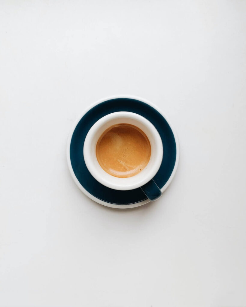 cup of espresso with white background