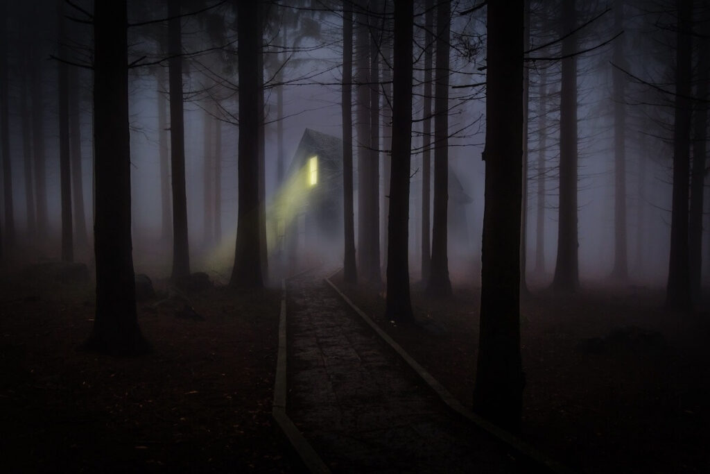 haunted house in the forest. Rhode Island is famous for the real "Conjuring" house.