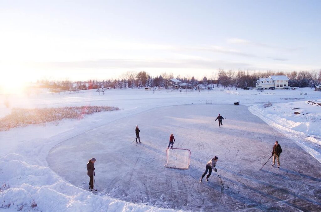 men playing ice hockey in Minnesota
