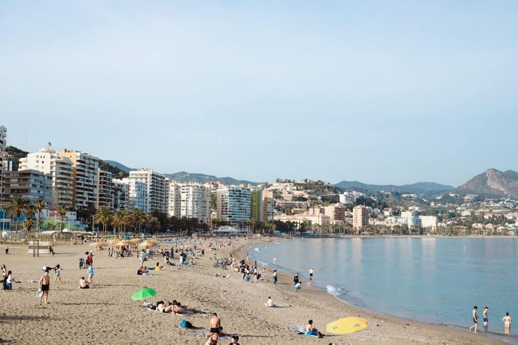 people enjoying in a beach in Malaga