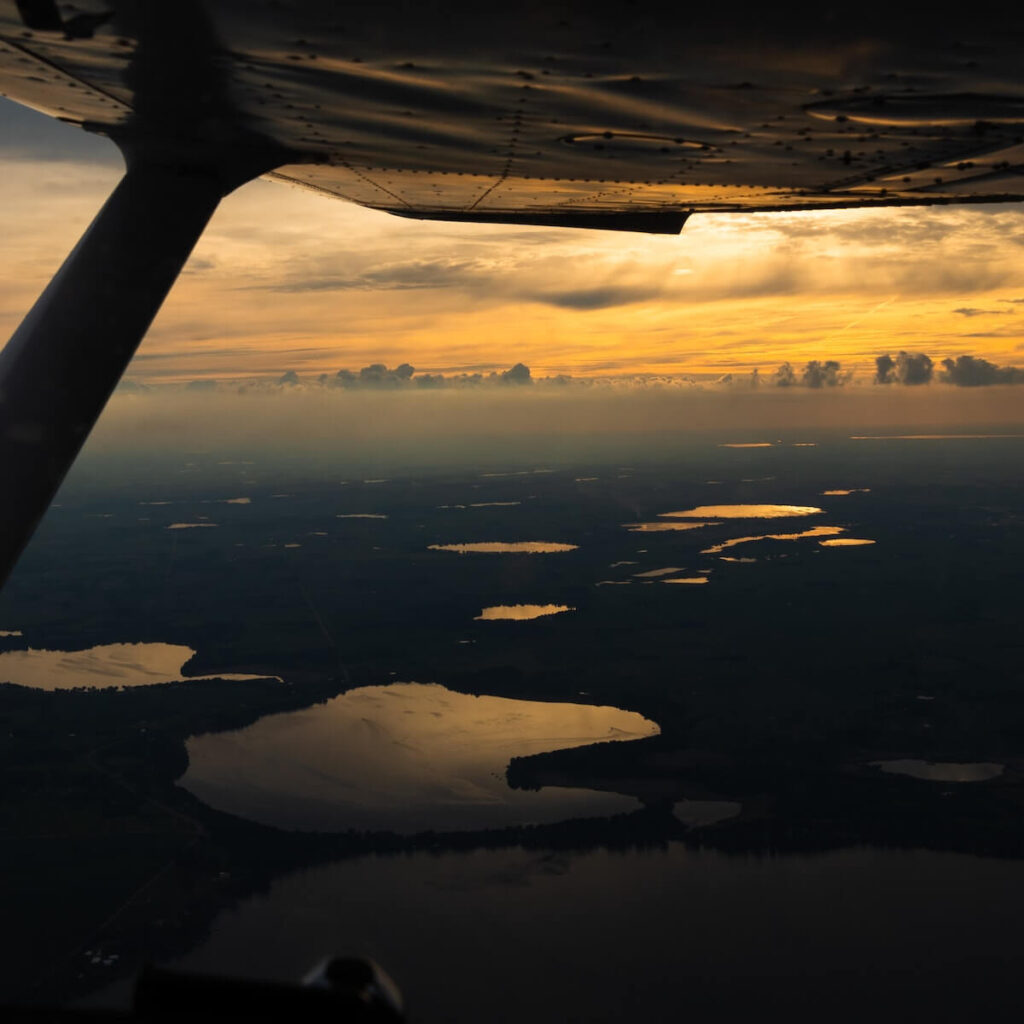 view of lake from the bottom of a plane