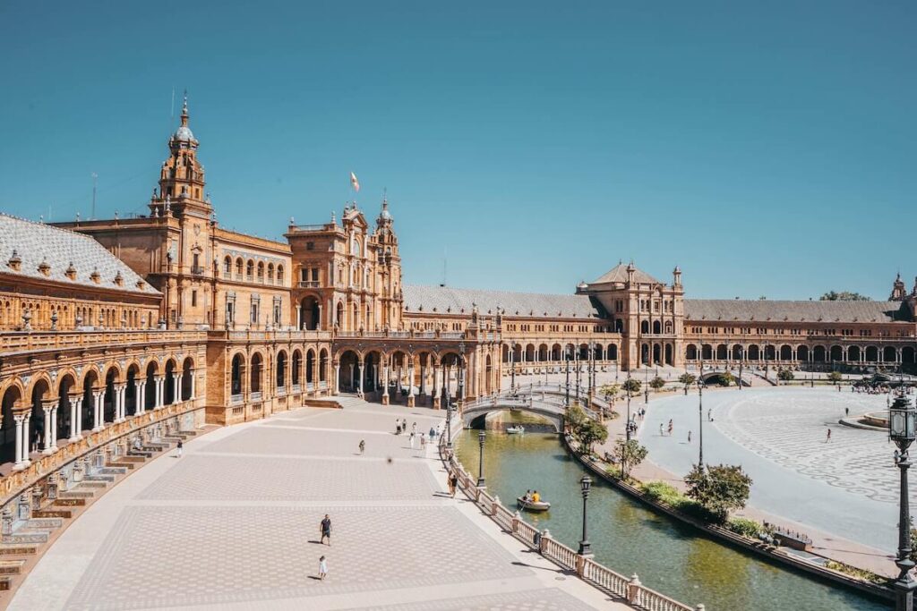 a panoramic shot of Plaza de España in Seville on a sunny day