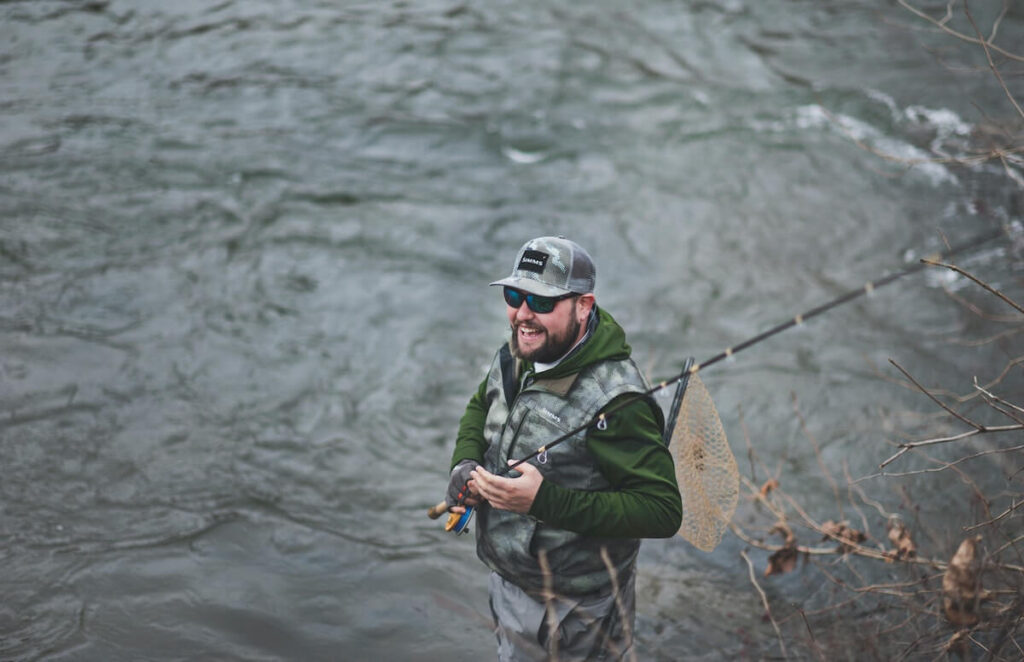 Man fishing on river