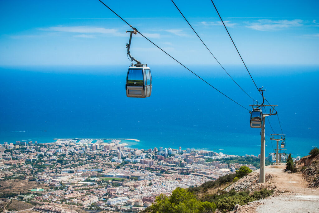 Benalmádena teleferico shot from the top of Calamorro with city and coastline in the background