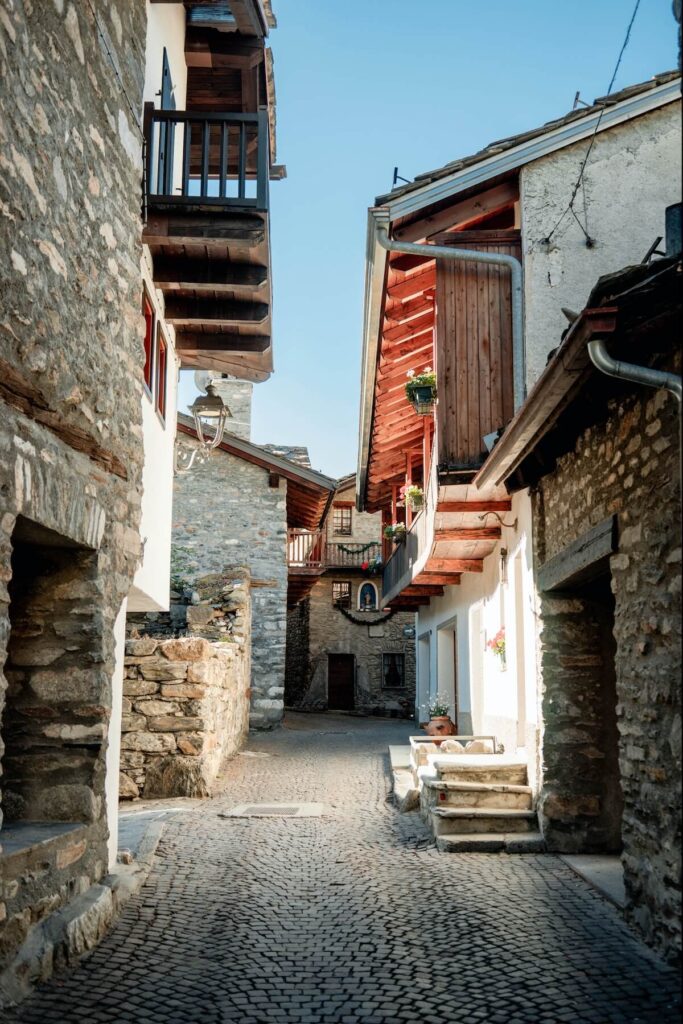 quaint cobblestone street in courmayeur