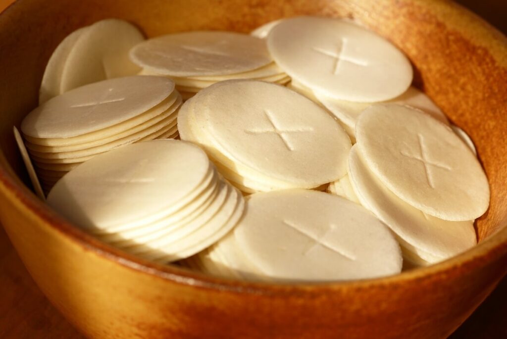 Close-up of communion wafers in a bowl