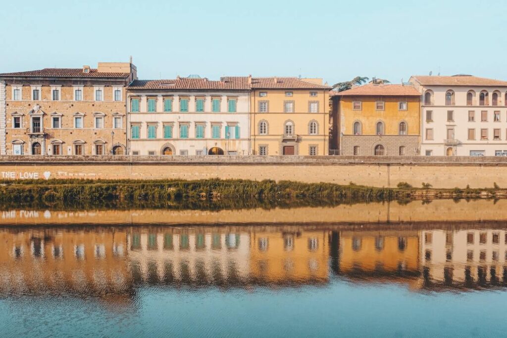 row of houses along Arno river in Pisa