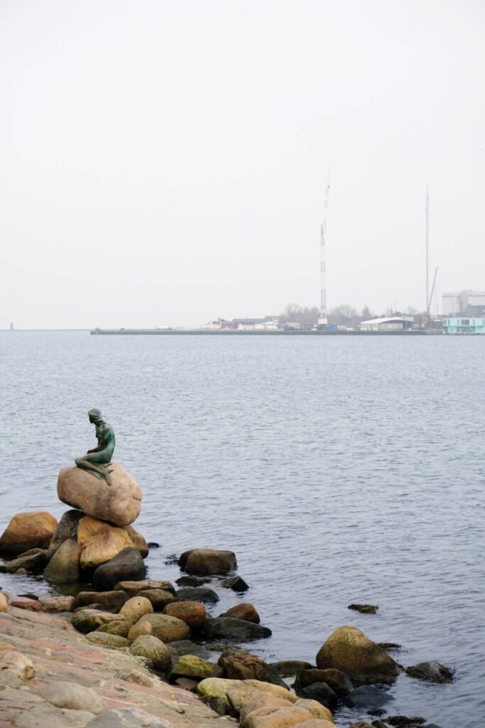 The little mermaid statue on a rock