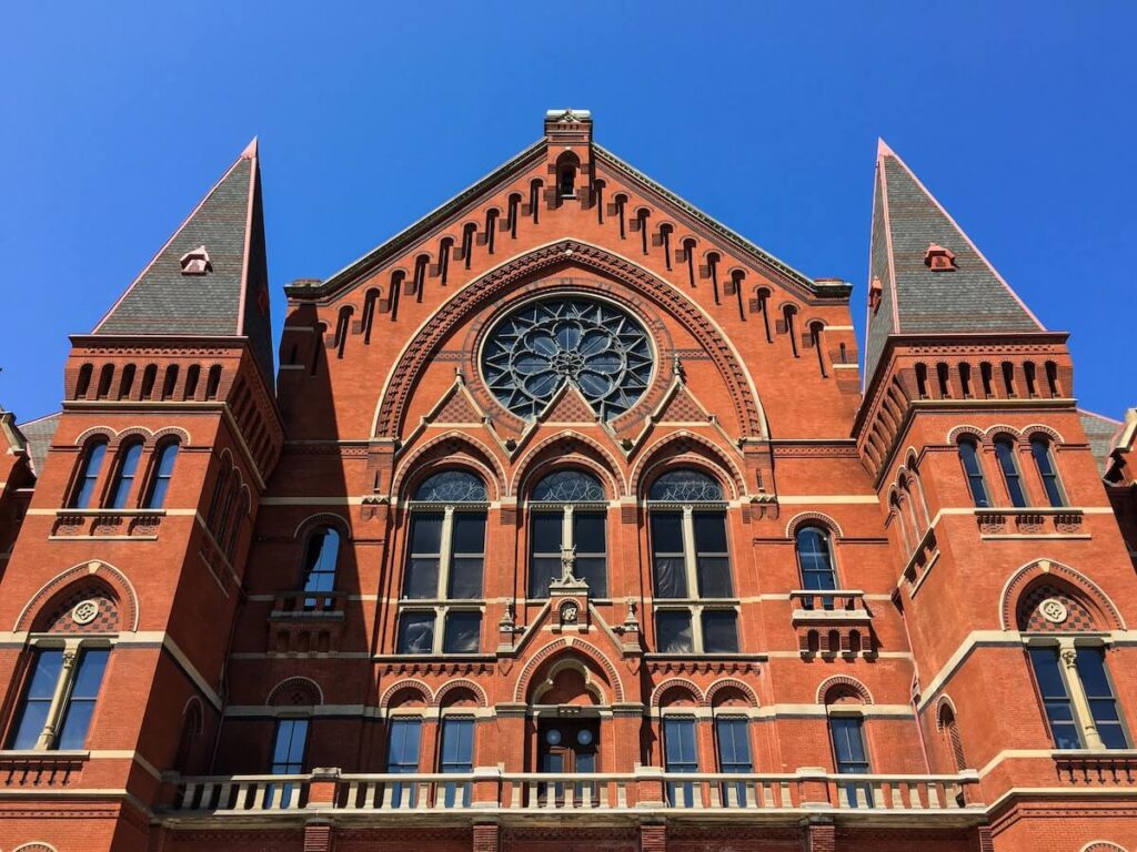 The front of the Cincinnati Music Hall, against blue sky, just before the renovations were completed