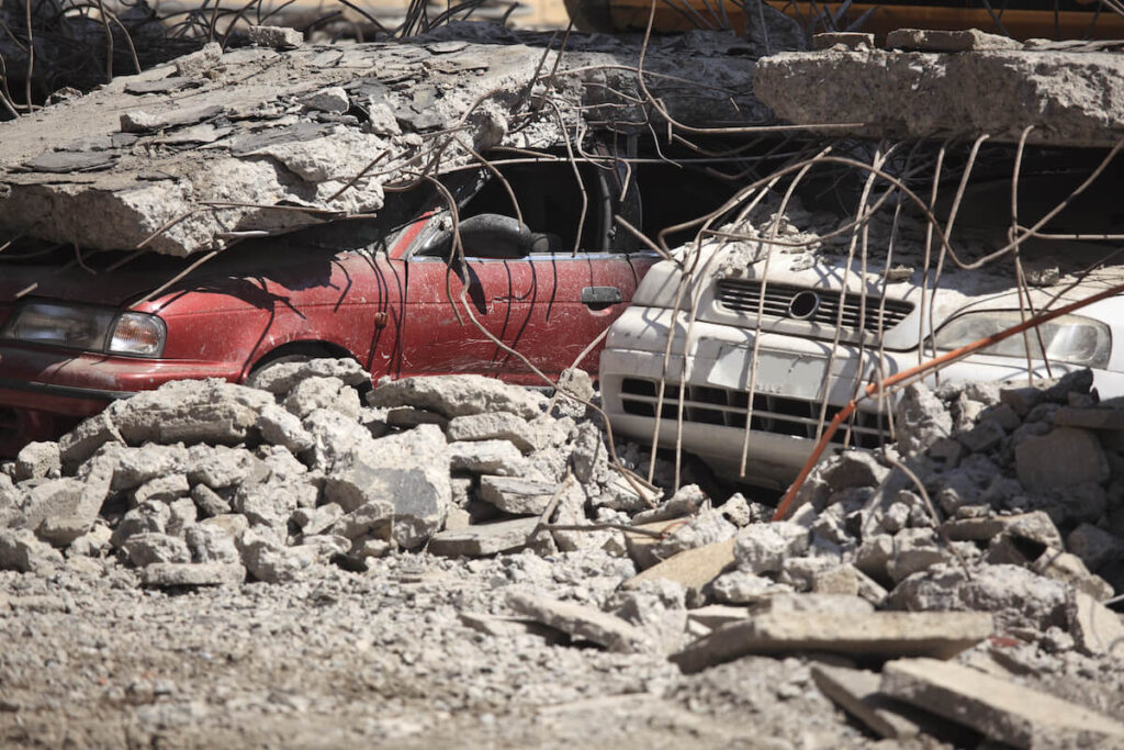 Cars under the rubble for an earthquake in Chile