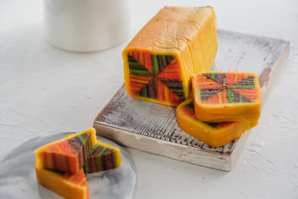 Malaysian dessert known as Kek Lapis Sarawak or Sarawak layered cake with white background