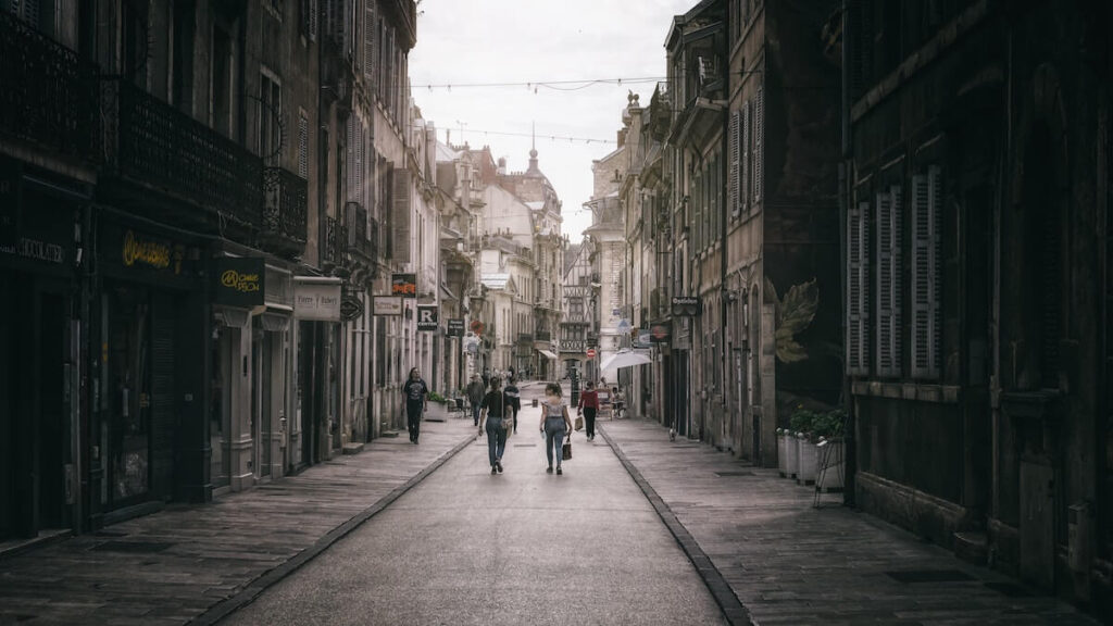 few people walking along street in Dijon