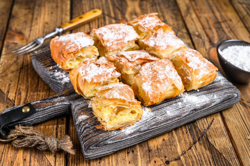 Greek pastry Bougatsa with phyllo dough and semolina custard cream.