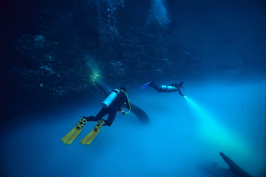 Divers in Cenote Angelita